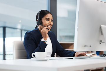 Image showing Call center, woman and talking at computer in office for customer service, tech support and sales consulting. Happy female agent, telemarketing and communication at desktop for telecom, CRM or advice