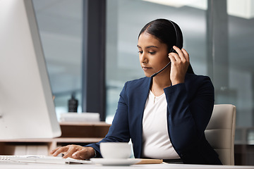 Image showing Computer, telemarketing and woman typing in call center office for customer service, help desk or technical support. Crm, contact us and female sales agent, business consultant or employee listening.