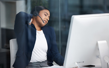 Image showing Call center, customer service and woman with back pain in the office while working on an online consult. Medical emergency, sprain neck muscle and female telemarketing agent with crm communication.