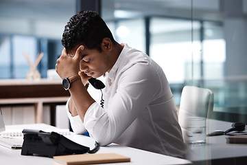 Image showing Phone call stress, talking and a businessman in an office for communication and contact problem. Burnout, networking and a corporate employee in a conversation with a headache and business mistake