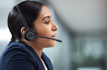 Image showing Talking, telemarketing and business woman in call center office for customer service, help desk or technical support. Crm, contact us and female sales agent, consultant or employee working with mic.