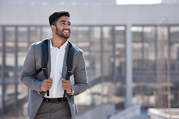 Image showing Travel, happy and businessman walking in the city to his office building in the morning. Confidence, backpack and professional male employee with a smile commuting to work in an urban town street.