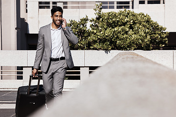 Image showing Corporate phone call, travel and a businessman in the city for networking and conversation. Smile, contact and an employee talking on a mobile with luggage for a business trip or journey to airport