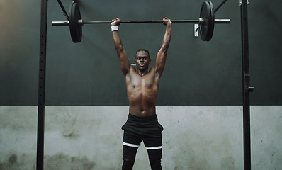 Image showing Weightlifting, fitness and black man with barbell in gym for training, exercise and intense workout. Deadlift, strong body and male body builder lifting weights for challenge, wellness and strength