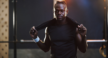 Image showing Serious, bodybuilder and portrait of black man in gym for training, exercise and strong workout. Fitness, muscles and face of male person with sweat towel for challenge, wellness and body strength