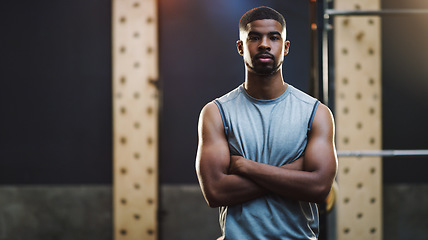 Image showing Crossed arms, bodybuilder and portrait of man in gym for training, exercise and strong workout. Fitness, muscles and serious male person in sports center for challenge, wellness and body strength