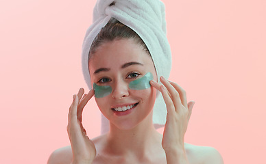 Image showing Skincare, portrait and happy woman with eye mask in studio for beauty, collagen and anti aging on pink background. Face, patches and female model with skin cosmetics, facial and hydration treatment