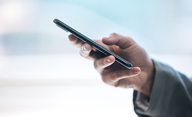 Image showing Phone, hand and communication with a business person typing a text message or email on a blurred background. Mobile, contact and networking with an employee browsing social media or texting closeup