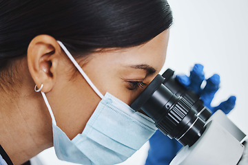 Image showing Science, laboratory and face of woman with microscope for medical analysis, research and lab test. Healthcare, biotechnology and female scientists with equipment for sample, experiment and virus