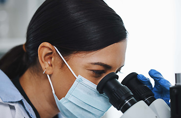 Image showing Science, laboratory and woman with microscope for research, medical analysis and lab test. Healthcare, biotechnology and female scientist with equipment for sample, experiment and exam for virus