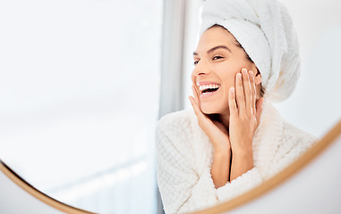 Image showing Mirror, happy woman and hands on face for skincare, smile and anti aging cosmetic result in bathroom. Facial, beauty and female touch soft, glow or smooth skin from luxury dermatology routine at home