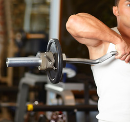 Image showing Gym hands, man and metal barbell, weights or workout equipment for bodybuilder training, fitness or power lifting. Muscle development, determined mindset and person exercising, weightlifting or focus