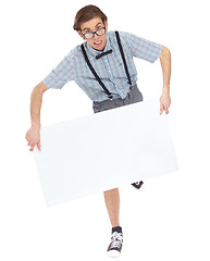 Image showing Falling, portrait and man with poster for mockup in studio isolated on white background. Board, glasses and funny male person, geek or IT nerd with advertising, marketing or copy space for insurance.