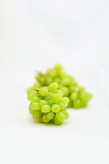 Image showing Fruit, green grapes and healthy food in studio for art and creativity for nutritionist. Fruits, wellness diet and nutrition with clean, vegan or grape snack isolated on a white background for health