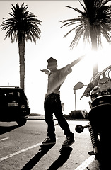 Image showing Dance, man dancing outside in a parking lot and performance in city background. Energetic or freedom, hip hop or breakdance by flexible male dancer entertainment in streets and freestyle body rhythm