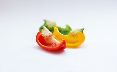 Image showing Vegetable, color and healthy food in studio with peppers, art and creativity for nutritionist. Cooking, wellness diet and nutrition with clean, green or vegan meal isolated on a white background