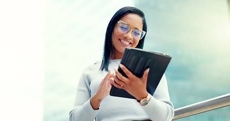 Image showing Business woman, happy and tablet while in city for online communication, networking or trading. Entrepreneur person with urban buildings and 5g network connection for writing email on mobile app