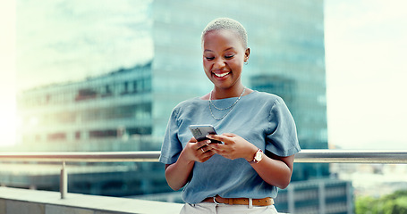 Image showing Black woman, phone and city business while happy and typing online for communication. Face of entrepreneur person with urban building background while on social media, writing post or trading website