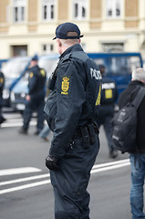 Image showing Law enforcement, protection and security with policeman in street for peace, safety and authority. Emergency services, justice and guard with male person in city for help, order and arrest