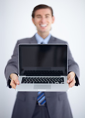 Image showing Laptop screen, mockup and business man in studio for website, email and administration. Happy, smile and technology with male employee in white background for corporate, internet and networking