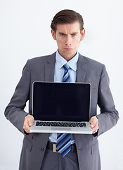 Image showing Blank screen, laptop and portrait of a upset business man with 404 and internet problem. Isolated, white background and studio with a male businessman with computer issue and technology error