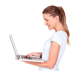 Image showing Happy woman, laptop and online research standing isolated against a white studio background. Excited female with smile working on computer or technology for browsing, email or networking on mockup