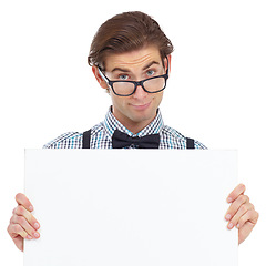 Image showing Portrait, nerd and man with poster in studio for mockup isolated on a white background. Board, glasses and male person, geek or IT guy with copy space for advertising, marketing or promotion banner.