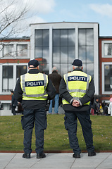 Image showing Law enforcement, protection and security with police officer in city for peace, safety and authority. Emergency services, justice and guard with person in street for enforcement, order and arrest