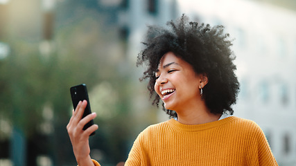 Image showing Video call, phone and black woman in city talking online, travel update and 5g communication or funny chat. Laughing gen z person or student on cellphone, mobile and live streaming for urban outdoor