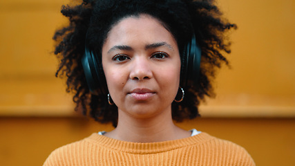 Image showing Black woman, portrait or music headphones on isolated yellow background, fashion mockup or wall mock up. Smile, happy or laughing student listening to radio, audio and podcast in trendy or cool cloth