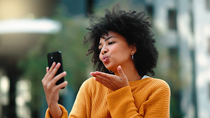 Image showing Video call, phone and black woman in city talking online, travel update and 5g communication or funny chat. Laughing gen z person or student on cellphone, mobile and live streaming for urban outdoor