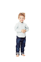 Image showing Happy, fashion and portrait of a child in jeans isolated on a white background in a studio. Smile, cute and a young boy kid with happiness for stylish and fashionable clothes as a toddler model