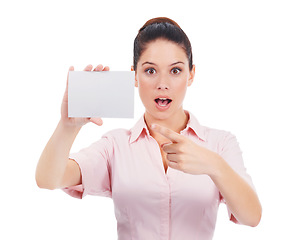 Image showing Mockup, business card and surprise with portrait of woman in studio for idea, networking and space. Corporate, signage and shock with employee pointing to paper on white background for news and promo