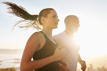 Image showing Sunrise, wellness and running couple doing workout or morning exercise for health and fitness together. Sport, marathon and woman runner run with man athlete training in cardio for sports or energy