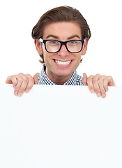 Image showing Portrait, happy and man with poster for mockup in studio isolated on a white background. Board, glasses and funny male person, geek or nerd with copy space for advertising, marketing or promotion.