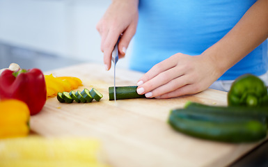 Image showing Woman, hands and cutting vegetables for healthy eating, nutrition or fiber on chopping board at home. Hand of female person preparing vegetable meal for diet, organic or natural food in kitchen