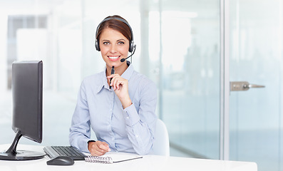Image showing Business woman, call center and smile in customer service, support or telemarketing at office. Portrait of happy female consultant agent smiling for online advice, advisory or help desk at workplace