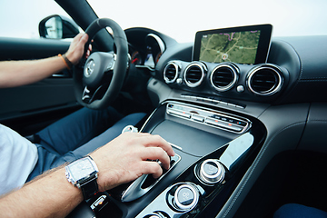 Image showing hand on automatic gear shift, Man hand shifting an automatic car