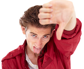 Image showing Man in portrait with tongue out, thumbs down and hand gesture for bad opinion isolated on white background. Problem, disagreement and wrong young male person with rejection, fail and negative mindset