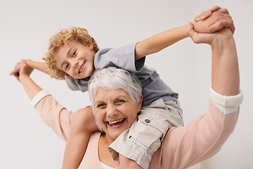 Image showing Portrait, piggyback or happy grandmother with a child playing or hugging with love in family home. Elderly grandma, kid or old woman relaxing, bonding or enjoying quality time together in retirement