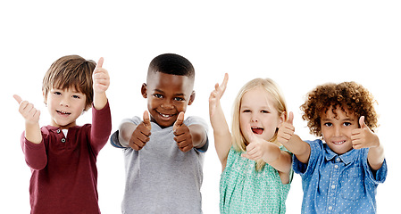 Image showing Children, group and thumbs up for diversity in studio portrait with smile, agreement and white background. Girl, boy or isolated friends for happiness, hand like or solidarity for kids with kindness