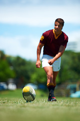 Image showing Sports, young rugby player kick a ball for conversion and in a field for a game or competition. Fitness or exercise, sportsman or training and professional male athlete playing on grass pitch outdoor