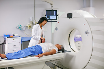Image showing Doctor, mri and woman holding hands of patient in hospital before scanning in machine. Ct scan, comfort and medical professional with senior female person in radiology test for healthcare in clinic.