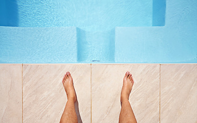 Image showing Water, feet and pov of man at a pool for swimming, leisure and summer, fun and relax. Barefoot, swimmer and legs of male person at poolside on holiday, vacation or enjoying a weekend swim outdoor