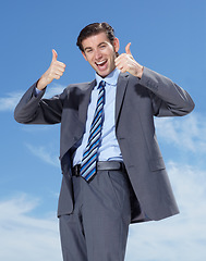 Image showing Thumbs up, business man and portrait with blue sky and happiness from work promotion. Target goal, happy and face with success hand sign for businessman in thank you, yes and achievement agreement
