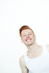 Image showing Portrait, smile and face of a man in studio with a smile, happiness and a positive attitude. Unique male model person with ginger or red hair isolated on a white background with mockup space