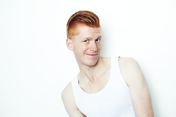 Image showing Portrait, doubt and a ginger man in studio isolated on a white background wearing a tank top. Face, confused and question with a young male person indoor on mockup looking skeptical in a vest