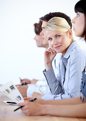 Image showing Portrait, meeting and a business woman in the boardroom during a strategy or planning workshop. Corporate, professional and seminar with a young female employee sitting at a table in the office