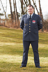 Image showing Portrait, Denmark and veteran general or official in uniform or flag on sleeve and male soldier outdoors. Danish military, hero and badge of honor or man officer or security and courage for war