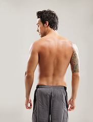 Image showing Back, results and a man for fitness and health isolated on a white background in a studio. Exercise, model and a person with progress from sports, workout and healthy lifestyle on a backdrop